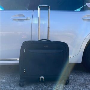 Samsonite Black Rolling Suitcase